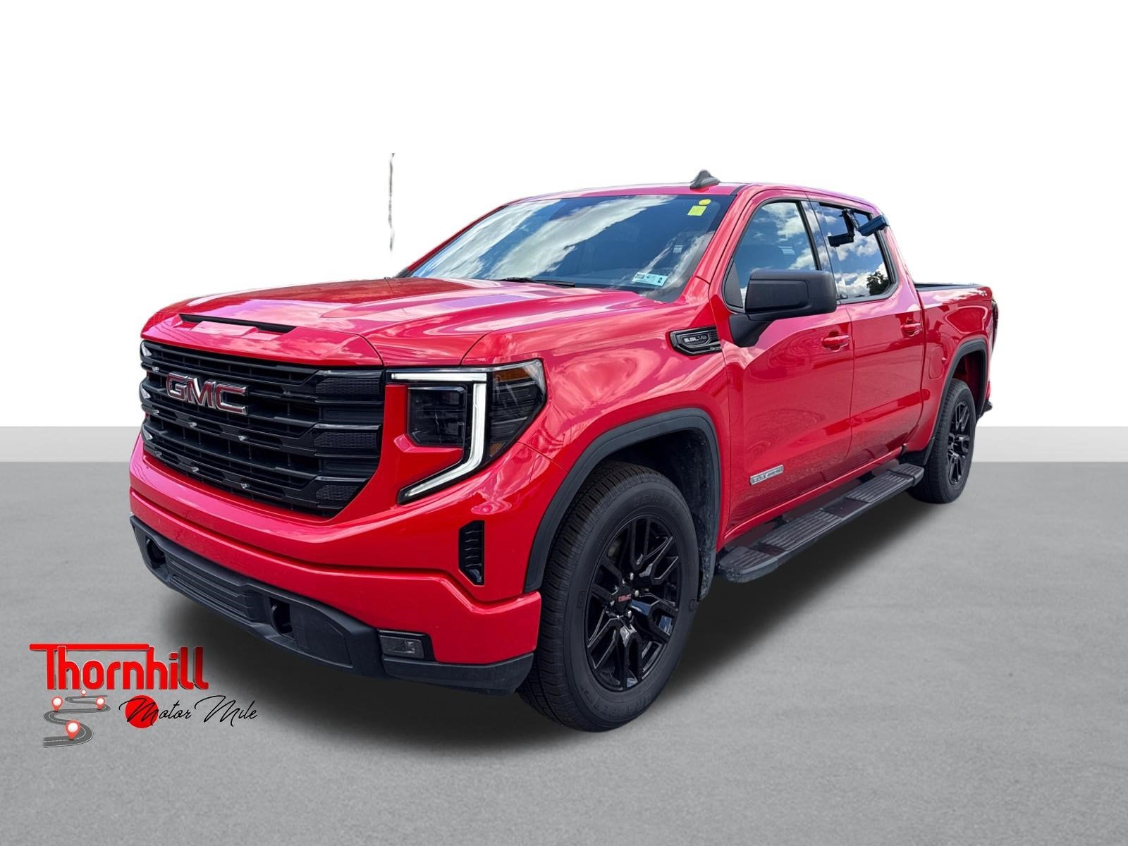 2025 GMC Sierra 1500 Elevation in Cardinal Red — front three-quarter view