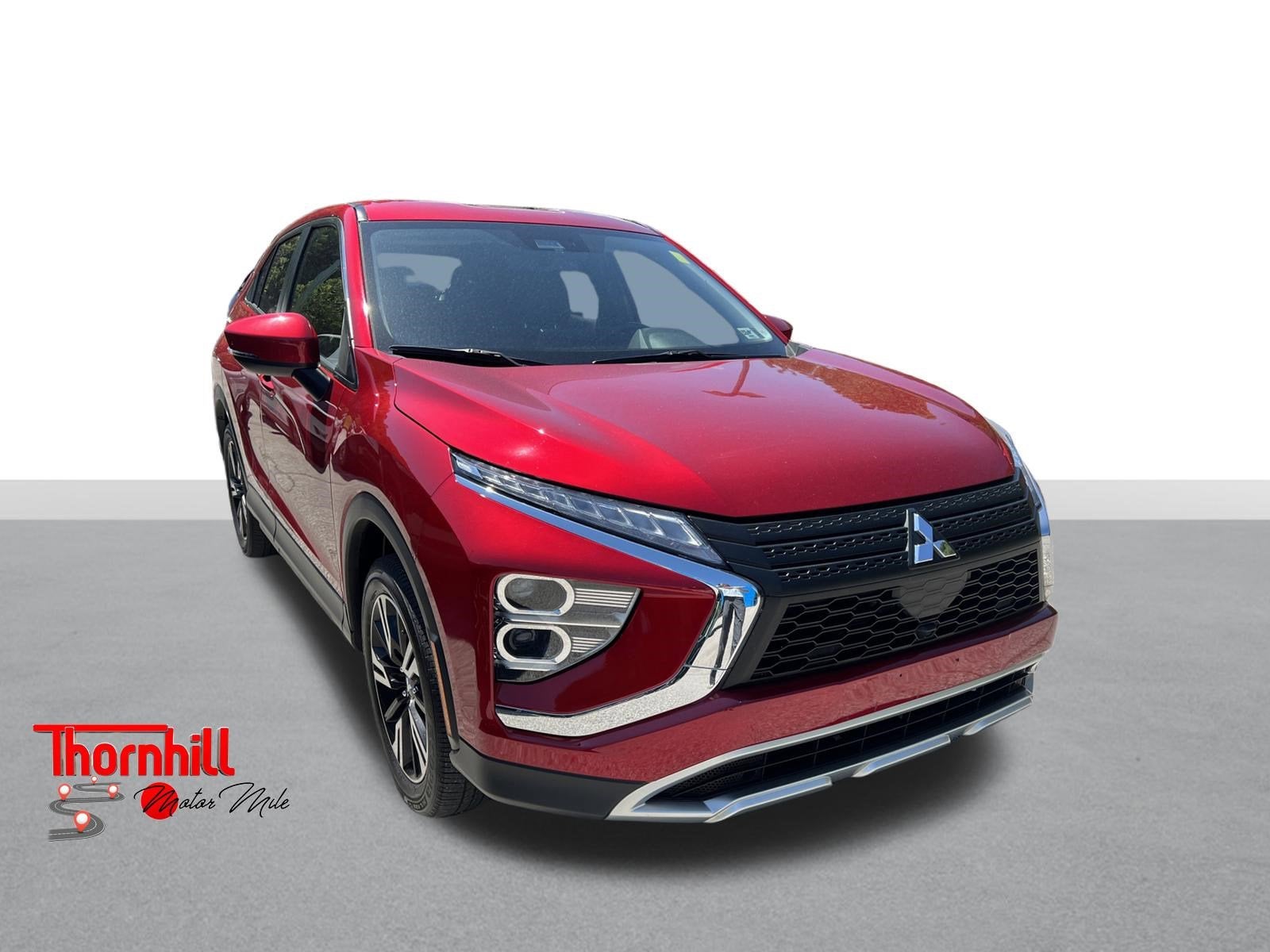 2024 Mitsubishi Eclipse Cross SE in Red — front three-quarter view